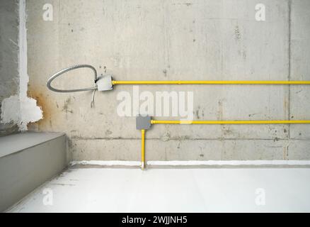 The power system and electrical wiring are neatly installed under the ceiling. Stock Photo