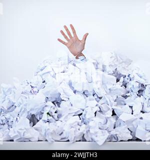 Person, business and hand or paper pile as corporate deadline or buried in documents for work stress, problem or responsibilities. Fingers, trapped Stock Photo