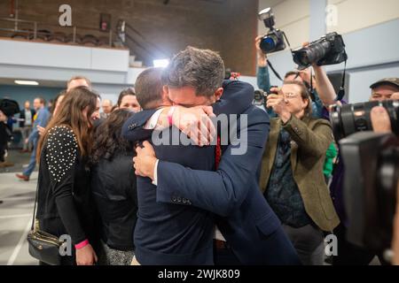 Labour candidate Damien Egan hugs his husband Yossi Felberbaum after being declared winner in the Kingswood by-election, at the Thornbury Leisure Centre, Gloucestershire. Issue date: Friday February 16, 2024. Stock Photo