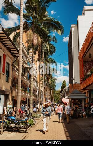 Medellin, Colombia - December 9, 2023: Street view capturing the essence of daily life in Medellin with ordinary people going about their routines. An Stock Photo