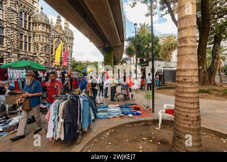 Medellin, Colombia - December 9, 2023: Street view capturing the essence of daily life in Medellin with ordinary people going about their routines. An Stock Photo