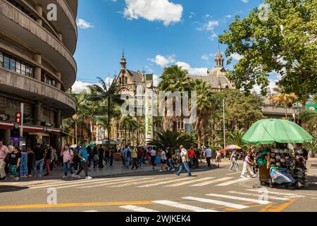 Medellin, Colombia - December 9, 2023: Street view capturing the essence of daily life in Medellin with ordinary people going about their routines. An Stock Photo