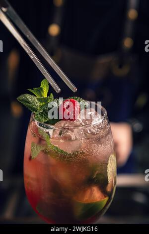 Summer cold refreshing cocktail or mocktail with raspberry, lime and mint Stock Photo