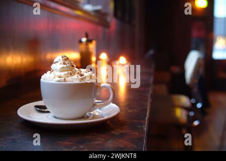 A cup of hot chocolate with whipped cream on top Stock Photo