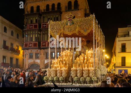 Procession of the pallium of the Virgen de la Esperanza Macarena in the early morning of Holy Week in Seville, Spain Stock Photo