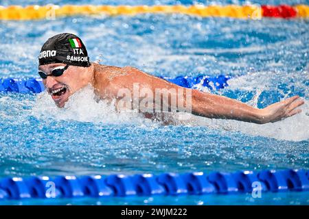 Doha, Qatar. 16th Feb, 2024. Gianmarco Sansone of Italy competes in the swimming 100m Butterfly Men Heats during the 21st World Aquatics Championships at the Aspire Dome in Doha (Qatar), February 16, 2024. Credit: Insidefoto di andrea staccioli/Alamy Live News Stock Photo