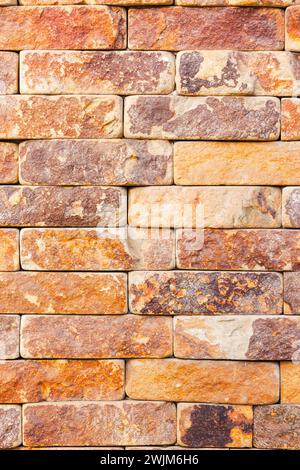 masonry of yellow brick tile. decorative architecture pattern for outdoor renovation Stock Photo
