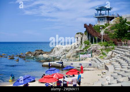 Gangneung City, South Korea - July 29th, 2019: The observatory and wooden stairs at Sodol Adeul Rock Park, offering a panoramic view of the East Sea a Stock Photo