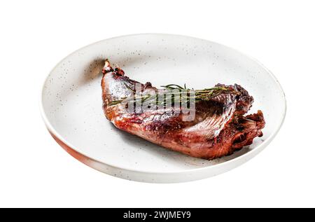 Baked rabbit leg with herbs, served on textile napkin. Organic farm meat. Isolated on white background. Top view Stock Photo