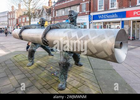 'Roll out the Lino' is a sculpture by David Annand and stand in The High Street in Staines-upon-Thames in Surrey, UK Stock Photo