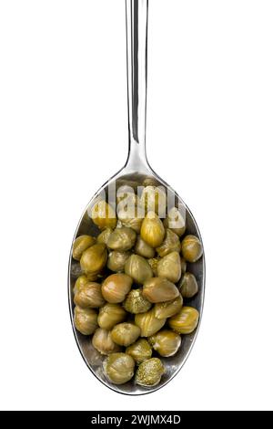 Single metal spoon with marinated capers close up on white background Stock Photo