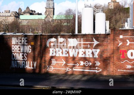 Glasgow Scotland: 12th Feb 2024: Tennent's Brewery Wellpark Tennent Caledonian exterior of factory. Home of Scottish beer Tennent's Lager Stock Photo