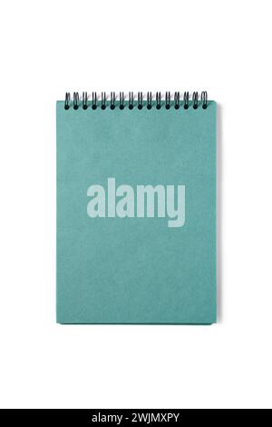 Open spiral bound notepad with craft turquoise sheets, isolated on white background. Top view, copy space for text, template, mockup Stock Photo
