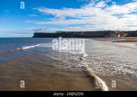 A view of the incoming tides at Saltburn,England,UK showing the seafront and beach area Stock Photo