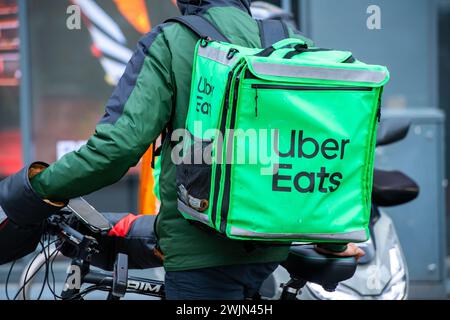 Leicester, Leicestershire, UK. 16th February 2024. Just Eat, Uber Eats and Deliveroo cyclists working in Leicester City Centre. Credit: Alex Hannam/Alamy Live News Stock Photo