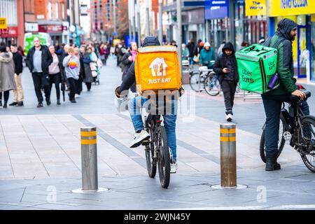 Leicester, Leicestershire, UK. 16th February 2024. Just Eat, Uber Eats and Deliveroo cyclists working in Leicester City Centre. Credit: Alex Hannam/Alamy Live News Stock Photo