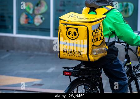 Leicester, Leicestershire, UK. 16th February 2024. Just Eat, Uber Eats and Deliveroo cyclists working in Leicester City Centre. Credit: Alex Hannam/Alamy Live News Stock Photo