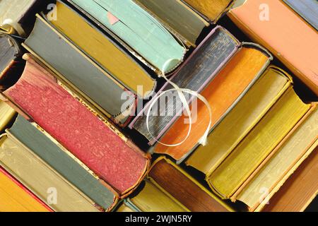 Flat lay with multicolored vintage books. Back to school,education,reading, learning, book fair, home office concept. Close up shot. Stock Photo
