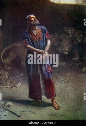 illustration of Daniel in the Den of Lions (Book of Daniel) By Harold Copping Stock Photo