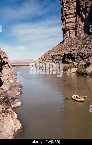 River rafting on the Rio Grande River in Santa Elena Canyon in Big Bend National Park with Mexico at right. Stock Photo