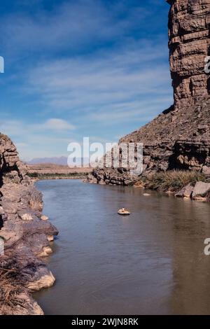 River rafting on the Rio Grande River in Santa Elena Canyon in Big Bend National Park with Mexico at right. Stock Photo