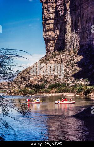 River rafting on the Rio Grande River in Santa Elena Canyon in Big Bend National Park with Mexico across the river. Stock Photo