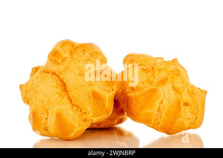 Three delicious eclairs, macro, isolated on white background. Stock Photo