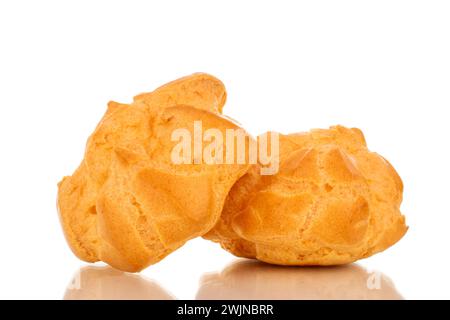 Two delicious eclairs, macro, isolated on white background. Stock Photo