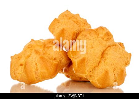 Three delicious eclairs, macro, isolated on white background. Stock Photo