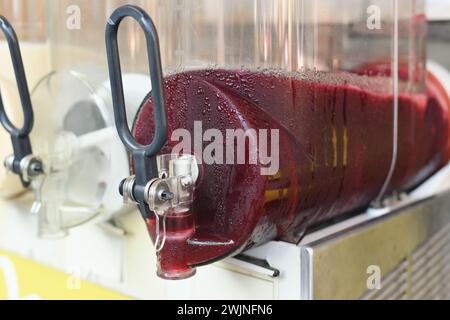 Ice granite containers Summer drink Juice device Stock Photo