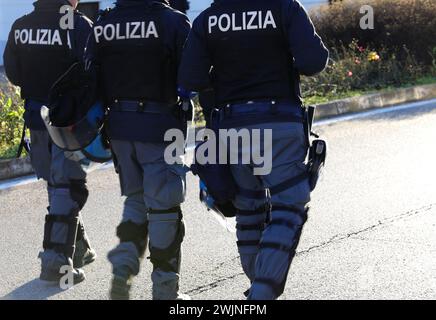 Vicenza, VI, Italy - January 20, 2024: Italian police in riot gear on the road of city Stock Photo