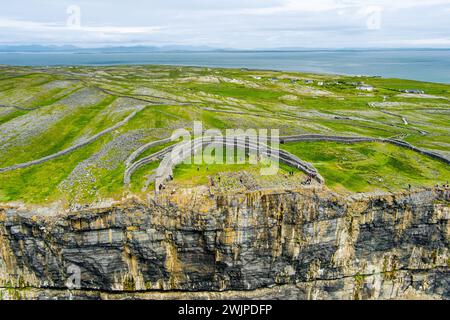 Aerial view of Dun Aonghasa or Dun Aengus , the largest prehistoric stone fort of the Aran Islands, popular tourist attraction, important archaeologic Stock Photo