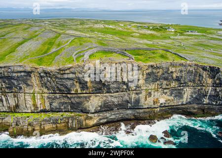 Aerial view of Dun Aonghasa or Dun Aengus , the largest prehistoric stone fort of the Aran Islands, popular tourist attraction, important archaeologic Stock Photo