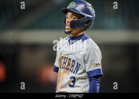 Houston, Texas, USA. 16th Feb, 2024. Southern University Jaguars infielder Caleb Tart (3) observes game action during the NCAA baseball game between the Alcorn State Braves and the Southern University Jaguars in the 2024 Cactus Jack HBCU Classic at Minute Maid Park in Houston, Texas. Prentice C. James/CSM/Alamy Live News Stock Photo