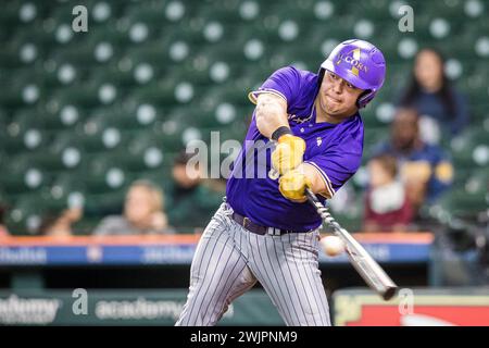 Houston, Texas, USA. 16th Feb, 2024. Alcorn State Braves infielder Nathan Gamez (35) drives the ball during the NCAA baseball game between the Alcorn State Braves and the Southern University Jaguars in the 2024 Cactus Jack HBCU Classic at Minute Maid Park in Houston, Texas. Prentice C. James/CSM/Alamy Live News Stock Photo