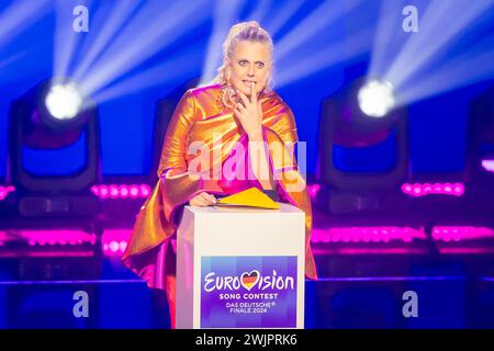Berlin, Germany. 17th Feb, 2024. Barbara Schöneberger, presenter, performs with Florian Silbereisen, singer, at the Eurovision Song Contest - The German Final 2024. The winner of the German preliminary round will represent Germany at the ESC in Malmö. Credit: Christoph Soeder/dpa Pool/dpa/Alamy Live News Stock Photo
