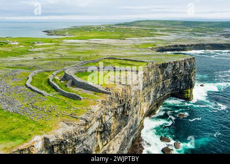 Aerial view of Dun Aonghasa or Dun Aengus , the largest prehistoric stone fort of the Aran Islands, popular tourist attraction, important archaeologic Stock Photo