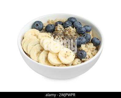 Tasty oatmeal with banana, blueberries and chia seeds in bowl isolated on white Stock Photo