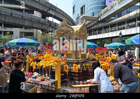 The highly revered Erawan Shrine at Ratchaprosong in Bangkok sees a constant stream of devotees throughout the day and night Stock Photo