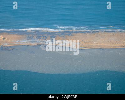 Aerial view of the Barra del Trabucador, in the Ebro Delta, on a winter sunset (Tarragona Catalonia Spain) ESP: Vista aérea de la Barra del Trabucador Stock Photo