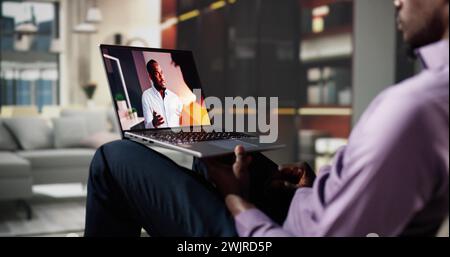 Man Watching Movie Online On Laptop. Video Channel Stock Photo