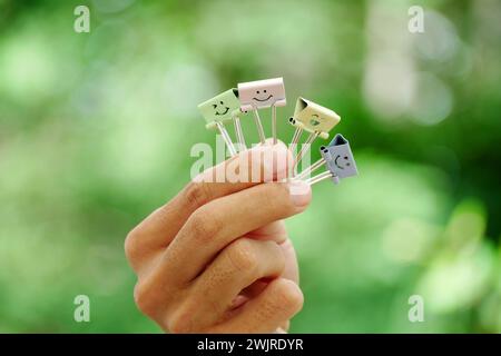 Happy Emoticon Paperclip On Finger Concept Of Positive Thinking 