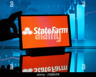 Germany. 16th Feb, 2024. In this photo illustration, a State Farm Mutual Automobile Insurance Company logo seen displayed on a tablet. (Photo by Igor Golovniov/SOPA Images/Sipa USA) *** Strictly for editorial news purposes only *** Credit: Sipa USA/Alamy Live News Stock Photo