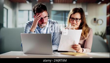 Family In Financial Trouble Having Stress Over Debt And Money Stock Photo