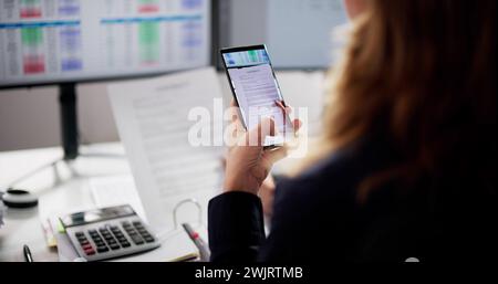 Taking Document Paper Photo Using Smartphone Scanner App Stock Photo
