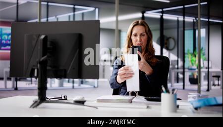 Taking Document Picture Or Photo With Phone. Smartphone Optical Document Stock Photo