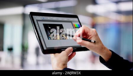 Graphic Designer Woman Working On Tablet Computer Screen Stock Photo