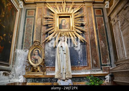 virgin mary statue in the Santi Vincenzo e Anastasio a Fontana di Trevi church in rome capital of italy EU Stock Photo
