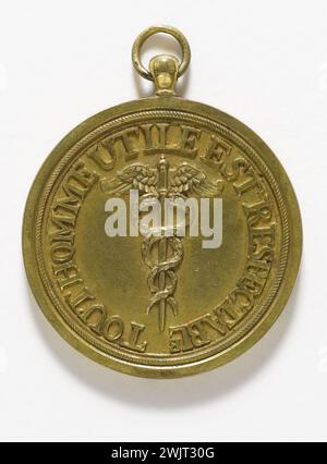 Anonymous. 'Service of the Council of Five Cents, 1795'. Brass. 1795. Paris, Carnavalet museum. Right a radiant Phrygian hat; Winged cadduke reverse in PAL. 500, Caducee, Council of five hundred, brass, medal, symbol, service Stock Photo