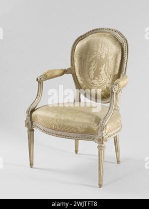 Jean-Baptiste SENÉ (1748-1803). Cabriolet armchair. Beech, around 1780. Paris, Carnavalet museum. Four fluted feet support connection dice decorated with rosettes, hence the belt with a twisted ribbon pattern, which is also found on the hanger of the backrest. The leafy scrolls follow in plan the movement of the belt and rest on consoles decorated with bay leaves and debited in the same wooden pieces as the front feet. The backrest is based on two Acanthe leaves, while the golden color lampas shows a bucolic scene to the sound of a flute played by a man seated on a wall and in a setting marked Stock Photo